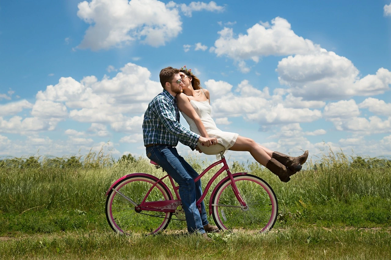 happy couples on a bike